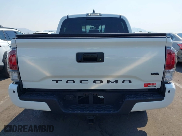 2023 Toyota Tacoma SR with VIN 3TMCZ5AN7PM630874, listed as a IAAI auction lot 40298041 with 8,635 mi miles and . Bid and sale history available at DreamBid. Image 16.