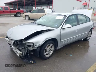 2003 Pontiac Bonneville SE z VIN 1G2HX52K034121638, wystawiony jako IAAI lot #41859616 z przebiegiem 205 353 mil mil oraz . Historia ofert i sprzedaży dostępna na DreamBid. Obrazek 2.