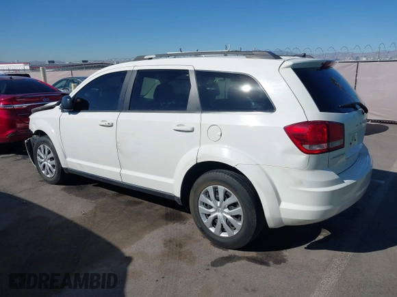 2014 Dodge Journey American Value Pkg with VIN 3C4PDCAB5ET230096, listed as a IAAI auction lot 41846510 with 178,397 mi miles. Bid and sale history available at carsss.com. Image 3.