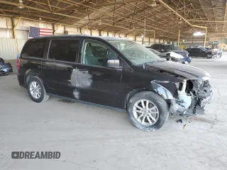 2015 Dodge Grand Caravan SXT with VIN 2C4RDGCG5FR632388, listed as a Copart auction lot 54719625 with 67,996 mi miles and Salvage Title. Bid and sale history available at DreamBid. Image 4.