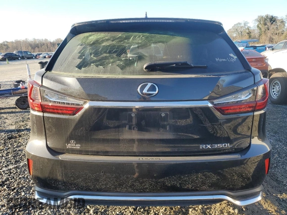 2021 Lexus RX 350L with VIN JTJHZKEA1M2021324, listed as a Copart auction lot 79802474 with 84,221 mi miles and Salvage title. Bid and sale history available at DreamBid. Image 6.