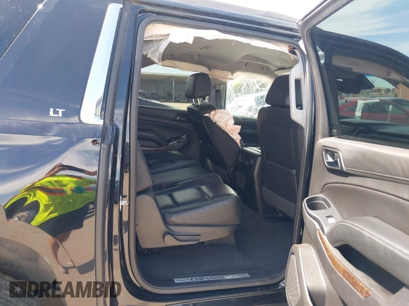 2020 Chevrolet Suburban LT z VIN 1GNSCHKC2LR305366, wystawiony jako IAAI lot #42080587 z przebiegiem 163 540 mil mil oraz . Historia ofert i sprzedaży dostępna na DreamBid. Obrazek 8.
