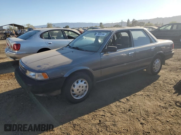 1989 Toyota Camry z VIN JT2SV21E8K0314703, wystawiony jako Copart lot #76053194 z przebiegiem 124 873 mil mil oraz Nie do naprawy • Non repairable. Historia ofert i sprzedaży dostępna na DreamBid. Obrazek 1.