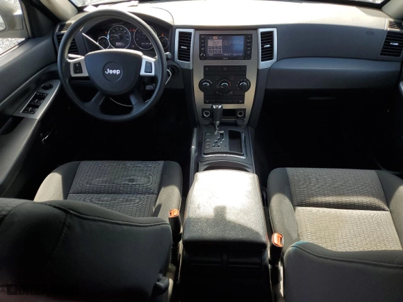 2009 Jeep Grand Cherokee Laredo with VIN 1J8GR48K09C551423, listed as a Copart auction lot 54094465 with 163,263 mi miles and Clean Title. Bid and sale history available at carsss.com. Image 8.