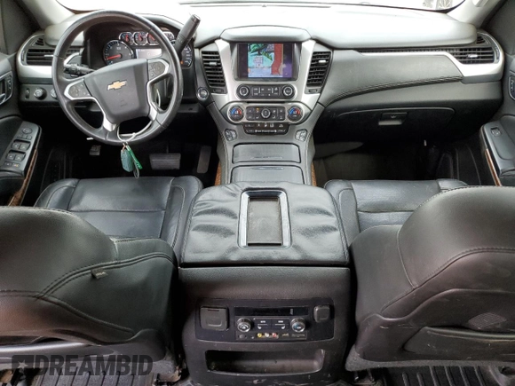2015 Chevrolet Tahoe LTZ z VIN 1GNSKCKC0FR198361, wystawiony jako Copart lot #54220155 z przebiegiem 176 429 mil mil oraz Szkoda całkowita • Salvage title. Historia ofert i sprzedaży dostępna na DreamBid. Obrazek 8.