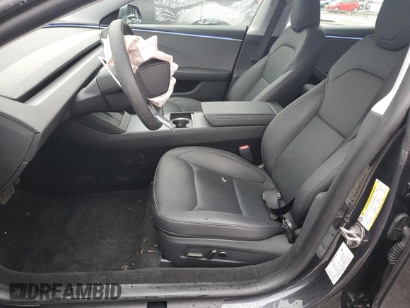 2024 Tesla Model 3 with VIN 5YJ3E1EA4RF730871, listed as a Copart auction lot 49066165 with 9,030 mi miles and Salvage Title. Bid and sale history available at carsss.com. Image 7.