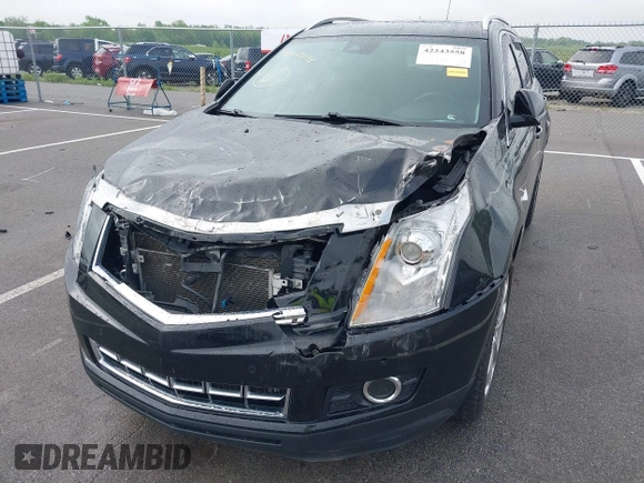 2015 Cadillac SRX Performance Collection with VIN 3GYFNCE3XFS638994, listed as a IAAI auction lot 42243558 with 141,704 mi miles and . Bid and sale history available at DreamBid. Image 6.