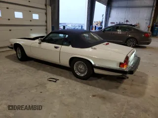 1989 Jaguar XJS z VIN SAJNV4847KC164497, wystawiony jako Copart lot #87258504 z przebiegiem 90 299 mil mil oraz Szkody całkowita. Historia ofert i sprzedaży dostępna na DreamBid. Obrazek 2.