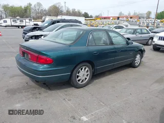 1998 Buick Regal LS with VIN 2G4WB52K3W1448533, listed as a IAAI auction lot 41930225 with 209,084 mi miles. Bid and sale history available at carsss.com. Image 4.