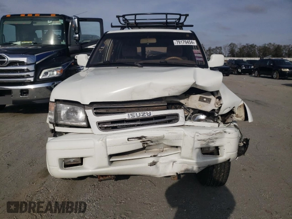 2000 Isuzu Trooper S with VIN JACDJ58X6Y7J06807, listed as a Copart auction lot 79179454 with 157,308 mi miles and Salvage title. Bid and sale history available at DreamBid. Image 5.