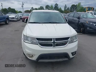 2017 Dodge Journey SXT with VIN 3C4PDCBG4HT572573, listed as a IAAI auction lot 42036006 with 209,854 mi miles and . Bid and sale history available at DreamBid. Image 12.