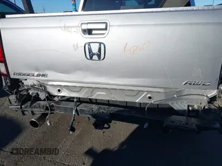 2022 Honda Ridgeline RTL-E with VIN 5FPYK3F78NB016045, listed as a IAAI auction lot 41626864 with 57,130 mi miles and . Bid and sale history available at DreamBid. Image 6.