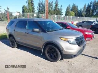 2015 Ford Police Interceptor Utility z VIN 1FM5K8AR3FGC27562, wystawiony jako IAAI lot #42159851 z przebiegiem 90 112 mil mil oraz . Historia ofert i sprzedaży dostępna na DreamBid. Obrazek 1.