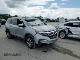2021 Honda Pilot EX-L z VIN 5FNYF5H58MB008921, wystawiony jako Copart lot #56985395 z przebiegiem Nie podano mil oraz Szkoda całkowita • Salvage title. Historia ofert i sprzedaży dostępna na DreamBid. Obrazek 14.