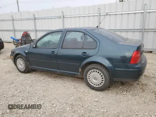2002 Volkswagen Jetta с VIN 3VWSB29M42M068867, выставлен на аукционе Copart как лот 67406454 с пробегом 214 613 миль миль и Списание • Salvage title. История ставок и продаж доступна на DreamBid. Изображение 2.