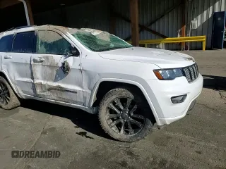 2018 Jeep Grand Cherokee Altitude with VIN 1C4RJFAG7JC257112, listed as a Copart auction lot 53370415 with 124,154 mi miles and Salvage title. Bid and sale history available at DreamBid. Image 12.