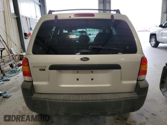 2005 Ford Escape XLT с VIN 1FMYU93185KA04997, выставлен на аукционе Copart как лот 57153325 с пробегом 121 348 миль миль и Списание • Salvage title. История ставок и продаж доступна на DreamBid. Изображение 6.