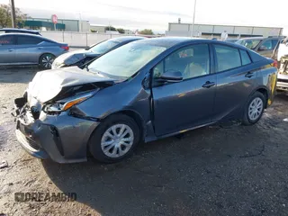 2020 Toyota Prius L Eco with VIN JTDKARFU3L3111231, listed as a IAAI auction lot 41398103 with 181,134 mi miles and . Bid and sale history available at DreamBid. Image 2.