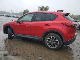 2016 Mazda CX-5 Grand Touring with VIN JM3KE4DY3G0713283, listed as a Copart auction lot 73346194 with 135,382 mi miles and Salvage Title. Bid and sale history available at carsss.com. Image 2.