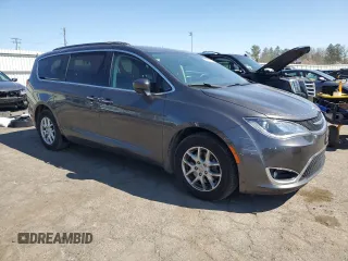 2017 Chrysler Pacifica Touring L with VIN 2C4RC1BG0HR770361, listed as a Copart auction lot 53789715 with 99,685 mi miles and Salvage Title. Bid and sale history available at DreamBid. Image 4.