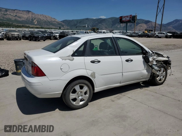 2005 Ford Focus S with VIN 1FAFP34N05W296550, listed as a Copart auction lot 59391835 with 216,509 mi miles and Salvage title. Bid and sale history available at DreamBid. Image 3.