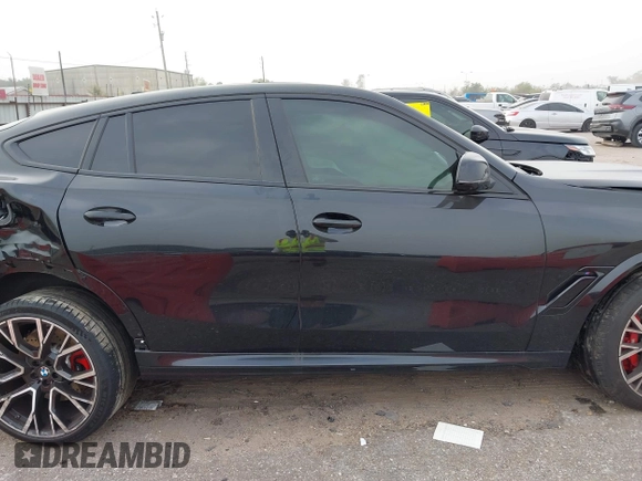 2024 BMW X6 M with VIN 5YM23ET07R9V10225, listed as a IAAI auction lot 40971354 with 1 mi miles. Bid and sale history available at carsss.com. Image 12.