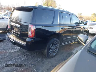 2019 GMC Yukon Denali with VIN 1GKS2CKJ2KR137664, listed as a IAAI auction lot 41335229 with 151,394 mi miles and . Bid and sale history available at DreamBid. Image 4.