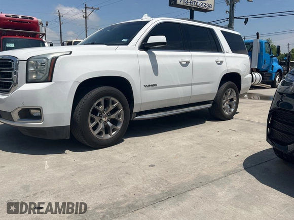 2015 GMC Yukon SLE with VIN 1GKS1AKCXFR513784, listed as a Copart auction lot 54203395 with 219,112 mi miles and Clean Title. Bid and sale history available at carsss.com. Image 2.