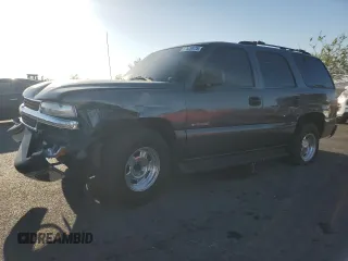 2001 Chevrolet Tahoe LS z VIN 1GNEC13T61R204699, wystawiony jako Copart lot #57529475 z przebiegiem 118 892 mil mil oraz Szkoda całkowita • Salvage title. Historia ofert i sprzedaży dostępna na DreamBid. Obrazek 1.