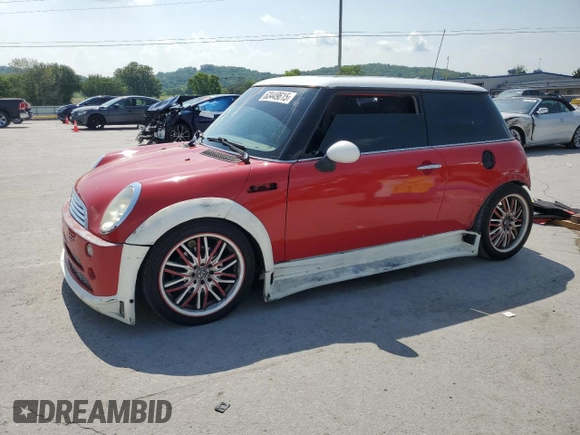 2004 MINI Hardtop with VIN WMWRC33444TC50103, listed as a Copart auction lot 63449615 with 144,467 mi miles and Salvage title. Bid and sale history available at DreamBid. Image 1.