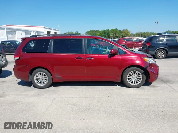 2012 Toyota Sienna XLE AAS with VIN 5TDYK3DC8CS258612, listed as a IAAI auction lot 41899311 with 75,779 mi miles and . Bid and sale history available at DreamBid. Image 13.