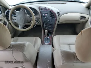 2001 Oldsmobile Aurora z VIN 1G3GR64H914122292, wystawiony jako Copart lot #75867154 z przebiegiem 120 977 mil mil oraz Szkody całkowita. Historia ofert i sprzedaży dostępna na DreamBid. Obrazek 8.