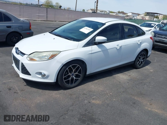 2012 Ford Focus SE with VIN 1FAHP3F24CL462319, listed as a IAAI auction lot 41981509 with 124,831 mi miles. Bid and sale history available at carsss.com. Image 2.