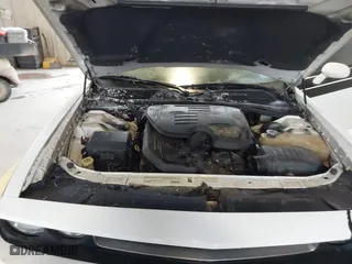 2011 Dodge Challenger with VIN 2B3CJ4DGXBH558348, listed as a IAAI auction lot 41532603 with 127,551 mi miles. Bid and sale history available at carsss.com. Image 10.