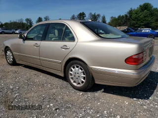 2000 Mercedes-Benz E-Class with VIN WDBJF65J2YB165568, listed as a Copart auction lot 70003994 with 146,518 mi miles and Salvage Title. Bid and sale history available at carsss.com. Image 2.
