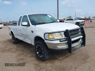 1998 Ford F-150 z VIN 1FTZX18WXWNA21502, wystawiony jako IAAI lot #42153307 z przebiegiem 294 721 mil mil oraz . Historia ofert i sprzedaży dostępna na DreamBid. Obrazek 1.