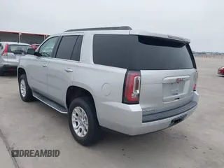 2015 GMC Yukon SLT with VIN 1GKS1BKC3FR253184, listed as a IAAI auction lot 41574610 with 152,543 mi miles. Bid and sale history available at carsss.com. Image 3.