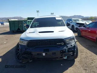 2021 Dodge Durango SRT Hellcat with VIN 1C4SDJH96MC692601, listed as a IAAI auction lot 41764490 with 27,434 mi miles and . Bid and sale history available at DreamBid. Image 13.