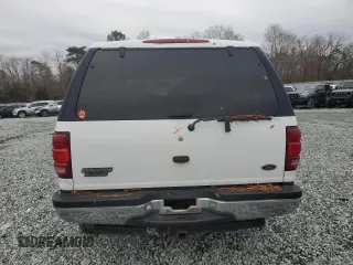 1997 Ford Expedition XLT with VIN 1FMEU17L5VLB80125, listed as a Copart auction lot 83892824 with 257,738 mi miles and Salvage title. Bid and sale history available at DreamBid. Image 6.
