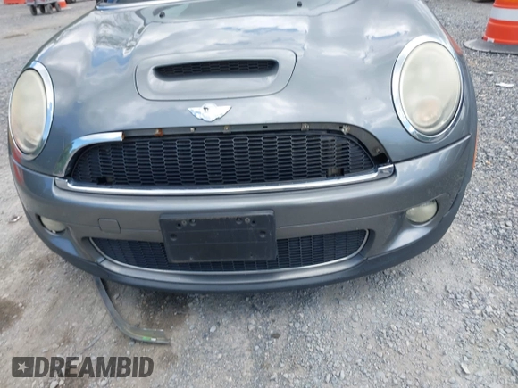 2009 MINI Hardtop S with VIN WMWMF73549TX41034, listed as a IAAI auction lot 42210662 with 108,118 mi miles and . Bid and sale history available at DreamBid. Image 6.