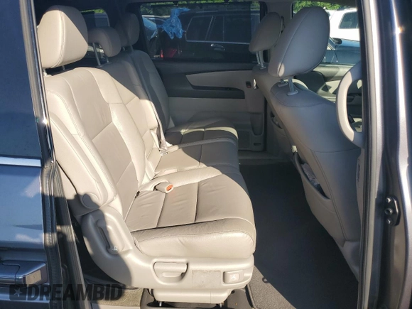 2014 Honda Odyssey Touring with VIN 5FNRL5H94EB116891, listed as a Copart auction lot 61400725 with 202,972 mi miles and Salvage title. Bid and sale history available at DreamBid. Image 11.