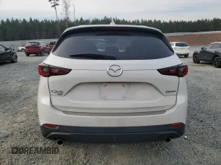 2023 Mazda CX-5 2.5 S Premium Package with VIN JM3KFBDM4P0182545, listed as a Copart auction lot 48975625 with 19,152 mi miles and Salvage Title. Bid and sale history available at carsss.com. Image 6.