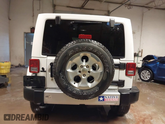 2014 Jeep Wrangler Unlimited Sahara with VIN 1C4BJWEG1EL326605, listed as a IAAI auction lot 41325037 with 135,824 mi miles. Bid and sale history available at carsss.com. Image 16.