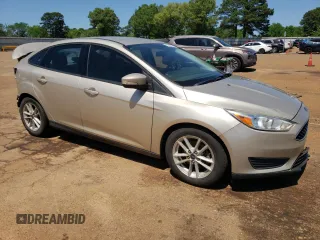 2017 Ford Focus SE with VIN 1FADP3F26HL295581, listed as a Copart auction lot 52158745 with 104,453 mi miles and Salvage title. Bid and sale history available at DreamBid. Image 4.