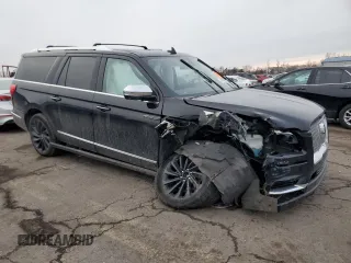 2021 Lincoln Navigator Black Label z VIN 5LMJJ3TT1MEL03959, wystawiony jako Copart lot #43876275 z przebiegiem Nie podano mil oraz Szkoda całkowita • Salvage title. Historia ofert i sprzedaży dostępna na DreamBid. Obrazek 4.