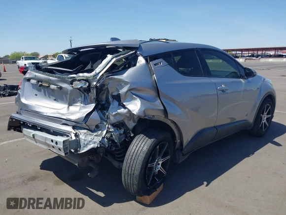 2020 Toyota C-HR LE with VIN JTNKHMBX4L1088502, listed as a IAAI auction lot 41982312 with 69,160 mi miles and . Bid and sale history available at DreamBid. Image 6.