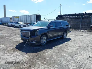 2015 GMC Yukon XL Denali with VIN 1GKS2JKJ5FR144991, listed as a IAAI auction lot 41877853 with 167,814 mi miles. Bid and sale history available at carsss.com. Image 2.