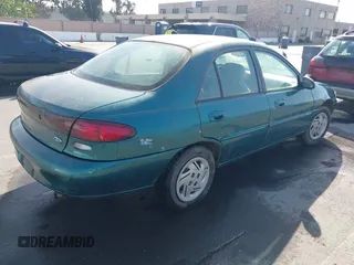 1997 Ford Escort LX with VIN 1FALP13P3VW125396, listed as a IAAI auction lot 42036066 with 132,239 mi miles. Bid and sale history available at carsss.com. Image 4.
