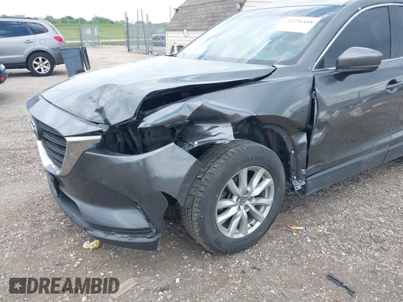 2016 Mazda CX-9 Sport z VIN JM3TCABYXG0126543, wystawiony jako IAAI lot #42256448 z przebiegiem 133 813 mil mil oraz . Historia ofert i sprzedaży dostępna na DreamBid. Obrazek 6.