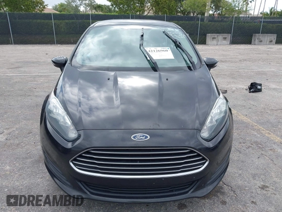 2015 Ford Fiesta SE with VIN 3FADP4BJ5FM130099, listed as a IAAI auction lot 42126960 with 82,299 mi miles and . Bid and sale history available at DreamBid. Image 12.